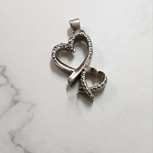 Elegant Silver Heart Pendant